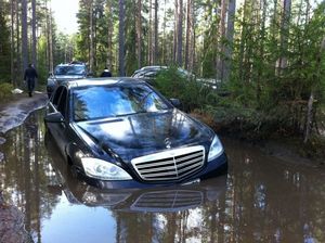 Mercedes-Benz in mud puddle