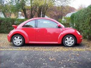 Red Volkswagen New Beetle
