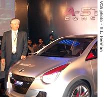 Maruti-Suzuki executive poses at unveiling of A-Star concept car