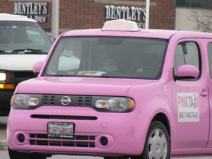 Pink Taxi Nissan Cube