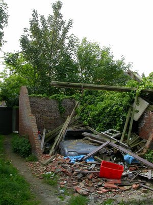 Car Under Collapsed Building