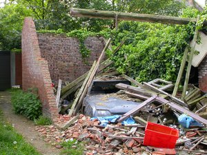 Car Under Collapsed Building