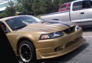 Modified Gold Ford Mustang