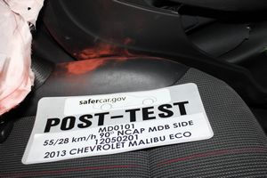 2013 Chevrolet Malibu ECO 1SA - Post-Test Driver Dummy Close-up Pelvis Contact with Vehicle Interior View