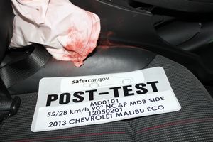 2013 Chevrolet Malibu ECO 1SA - Post-Test Driver Dummy Close-up Pelvis Contact with Side Airbag View