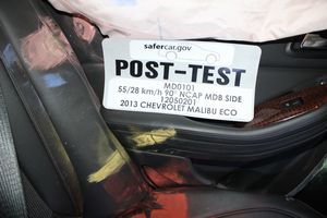 2013 Chevrolet Malibu ECO 1SA - Post-Test Rear Passenger Dummy Close-up Torso Contact with Vehicle Interior View