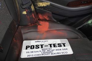 2013 Chevrolet Malibu ECO 1SA - Post-Test Rear Passenger Dummy Close-up Pelvis Contact with Vehicle Interior View