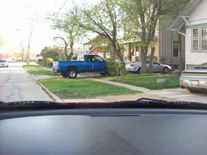 Truck Parked Across Sidewalk