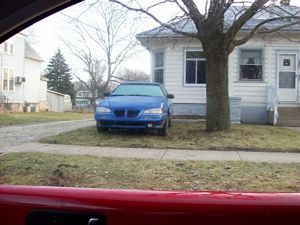 Car on Front Lawn