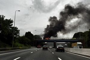 VW camper is on fire on a bridge over the M6