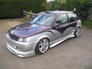 The owner of this Ford Fiesta is obviously addicted to Too Fast Too Furious.  And glue