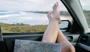 Feet out of car window