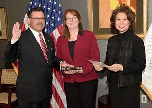 Elaine L. Chao swears in Raymond P. Martinez