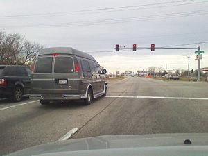 Chevrolet Conversion Van at Red Light