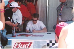 Dale Earnhardt Jr. 2002 Tropicana 400 signing autographs