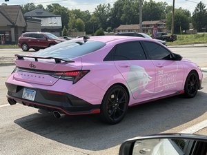 Modified Seventh Generation Hyundai Elantra with Red Bull Pink Edition wrap