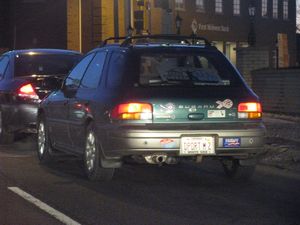 Subaru Impreza Outback with Political Bumper Stickers