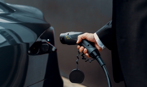 Plugging a Juice Cable Into an Electric Car