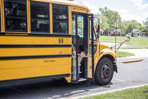 Kids Getting Off School Bus