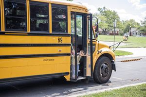 Kids Getting Off School Bus