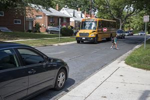 Crossing Street in front of School Bus