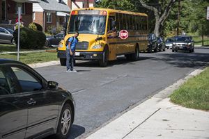 Crossing Street in front of School Bus