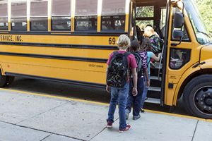 Children Boarding School Bus