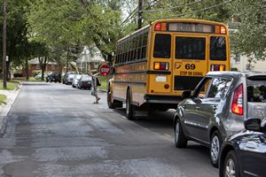 Crossing Street in front of School Bus