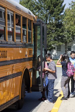 Children Boarding School Bus