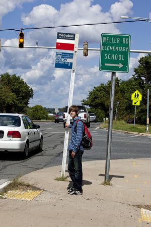 Student at Bus Stop