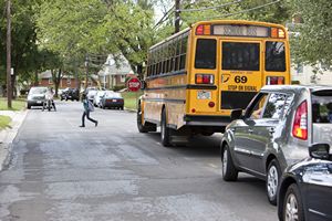 Crossing Street in front of School Bus