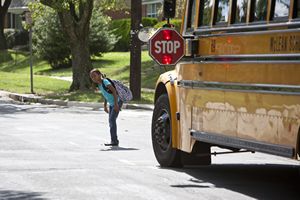 Crossing Street in front of School Bus