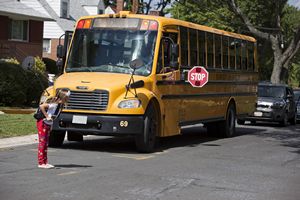 Crossing Street in front of School Bus