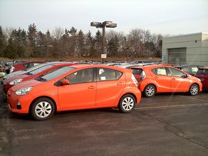 2012 Toyota Prius C in Habanero Orange