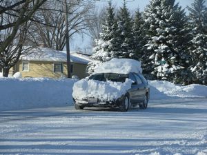Snow-Covered Ford Taurus Station Wagon
