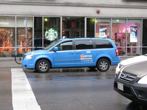 24 Seven Taxi Association Chrysler Town and Country Minivan